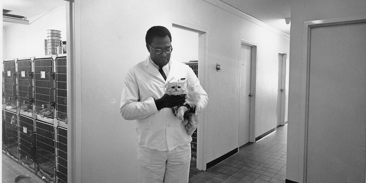B. Robert Lewis with a cat