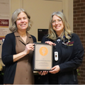 Dr. Jennifer Granick (right) receives the Zoetis Distinguished Teaching Award from CVM Dean Dr. Laura Molgaard. 