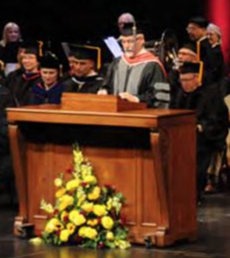 Dean Trevor Ames at Commencement in May