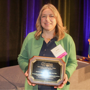 Dr. Jen Granick holds the Oustanding Faculty of the Year award