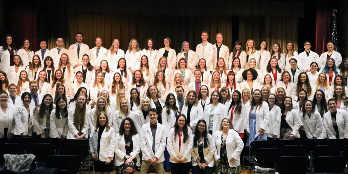 A general outfit for a Lady Doctor, a medical lab coat in white, and a  stethoscope a… | Nursing school graduation pictures, White coat ceremony,  Graduation pictures