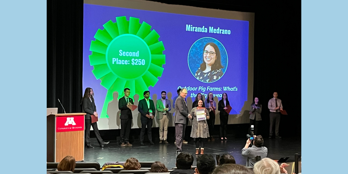 Dr. Miranda Medrano accepts her second place prize during the University of Minnesota Three Minute Thesis competition on Nov. 10, 2023.