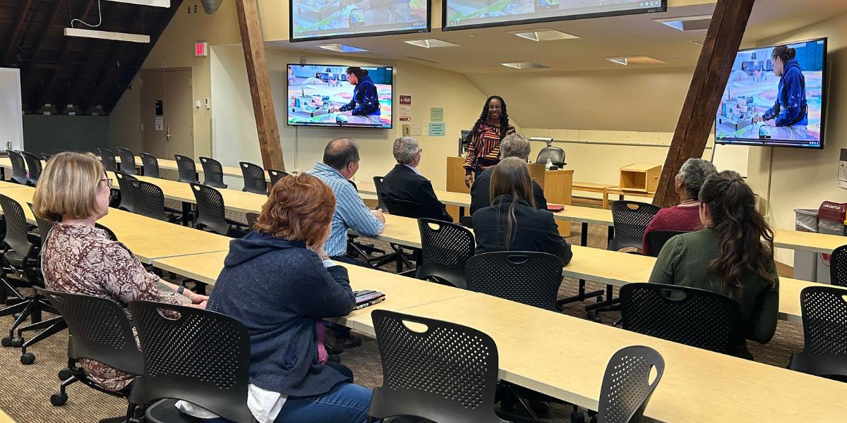 Tia Richardson speaks about her work as a mural artist during a film screening event held in January at the College of Veterinary Medicine. 