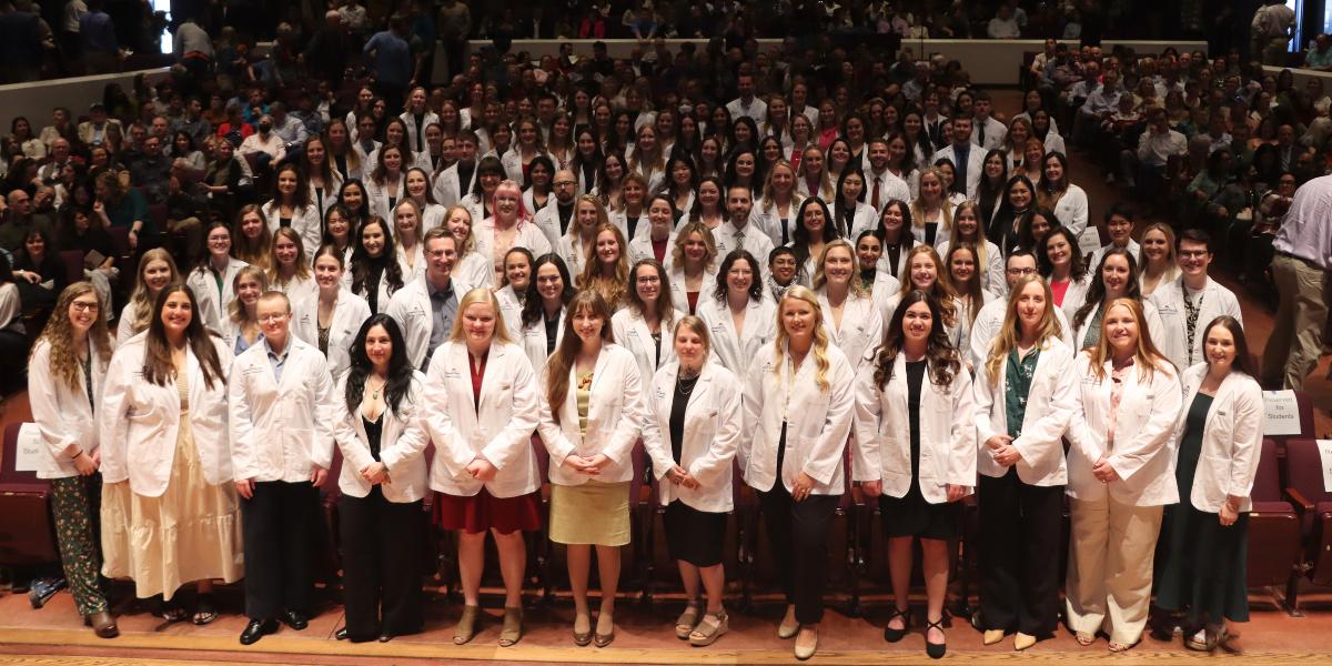 College of Veterinary Medicine students gather for a class photo following the 2024 White Coat Ceremony.
