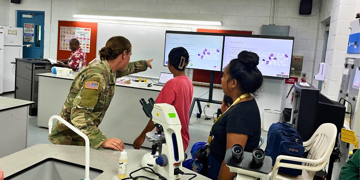 Dr. Whitney Waldsmith meets with local college students in the Marshall Islands and uses the blood samples retrieved from local dogs as a teaching opportunity to give students an overview of blood biology, blood cells, bone marrow, and blood parasites. 