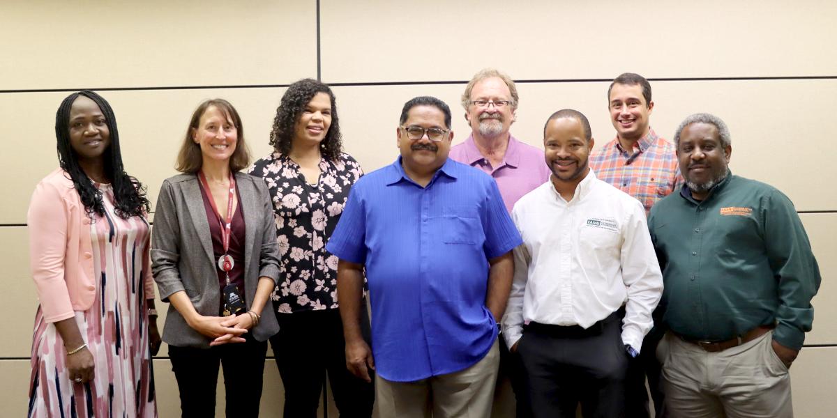 Left to right:  Omolola Betiku (FAMU), Tiffany Wolf (CVM), Starr Sage (UMN CFANS), Maxim CHeeran (CVM), Tom Molitor (CVM), Glen Wright (FAMU), Luciano Calexieta (CVM), and Keawin Sarjeant (FAMU). 