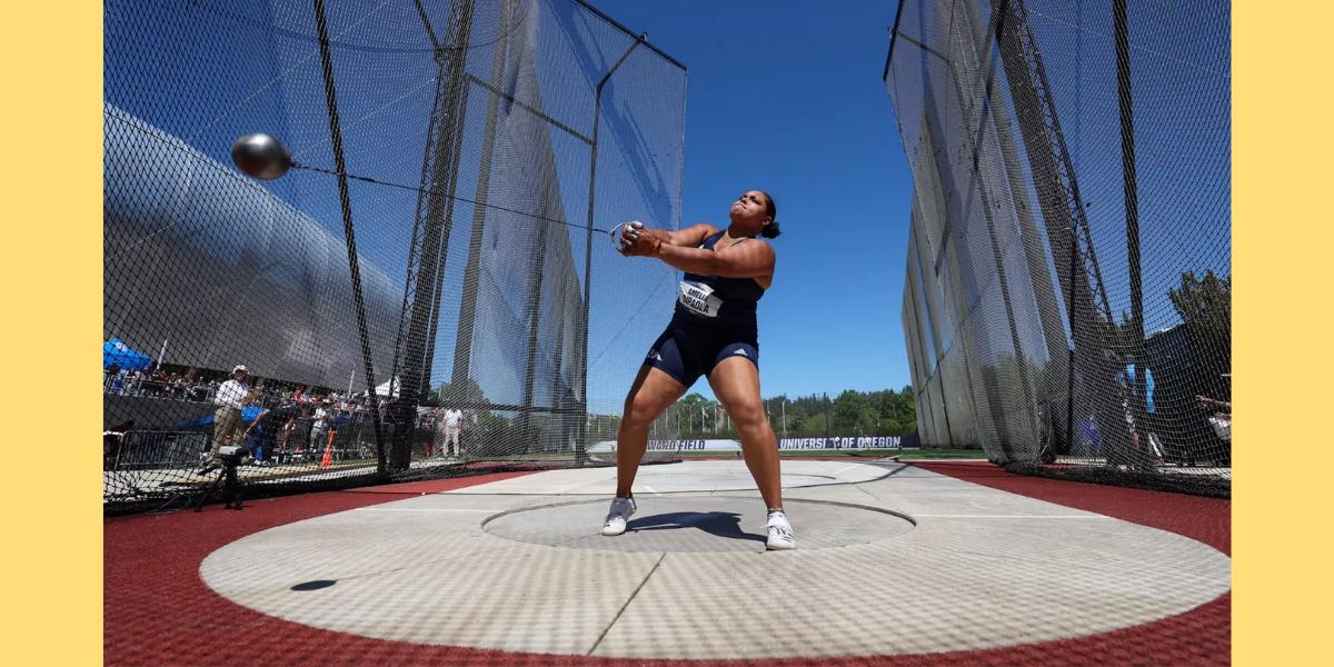 Amelia DiPaola swings a hammer during a track and field competition.