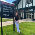 Courtney Labé stands outside the Ben Pomeroy Student-Alumni Learning Center. 